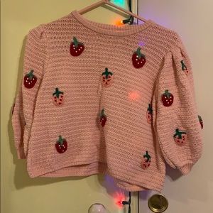 Pink knitted crop sweater with strawberries